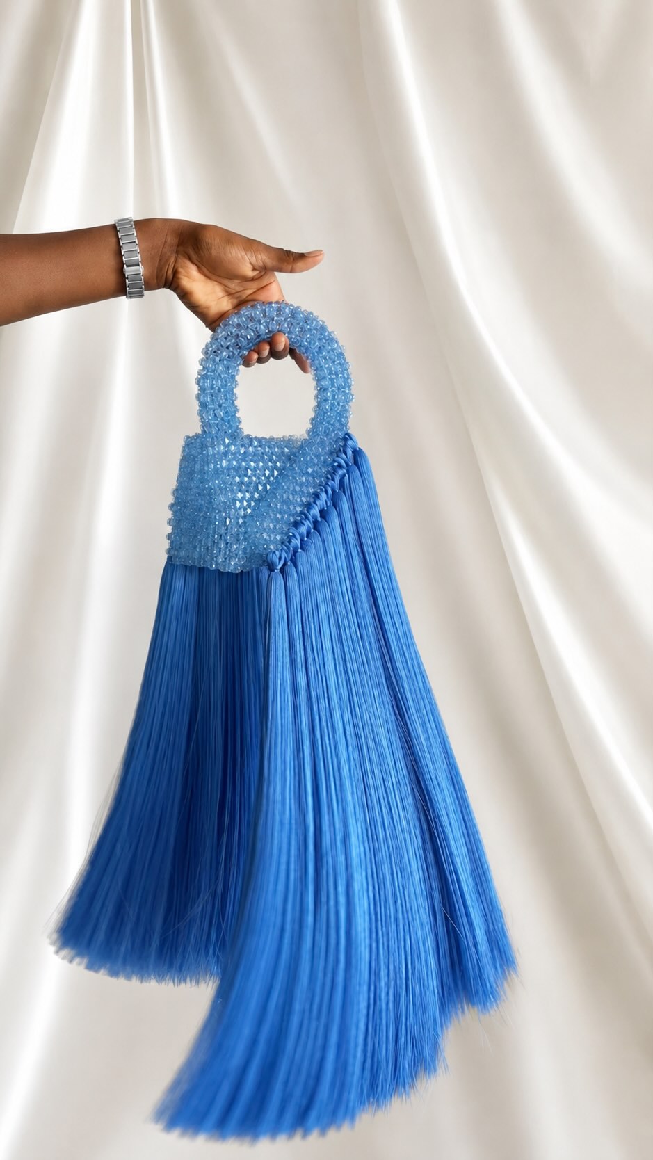 Woven Tassel Clutch
