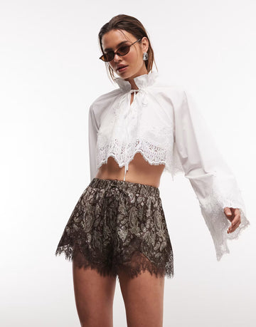 Shirt With Bell Sleeves and A Scalloped Lace Hem